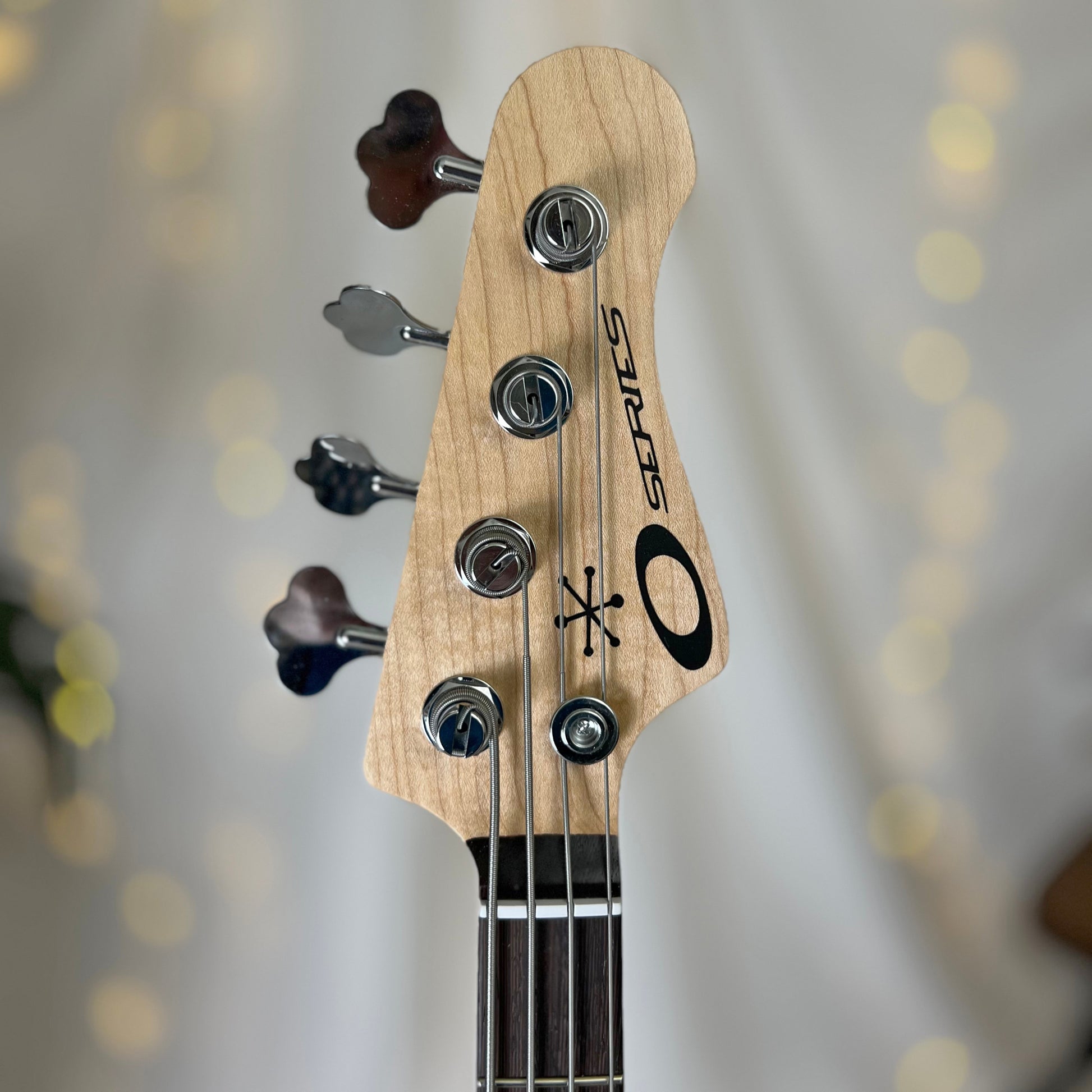 O* Series Pamela P 34-Inch Long-Scale Bass in Magic Black with EMG PVHZ Pickup (Passive) - 2E045002 - Headstock Front