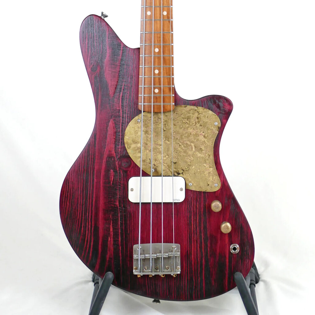 Offbeat Guitars Jackie-O 30" Short-Scale Bass in Bordeaux Glow on Distressed Pine