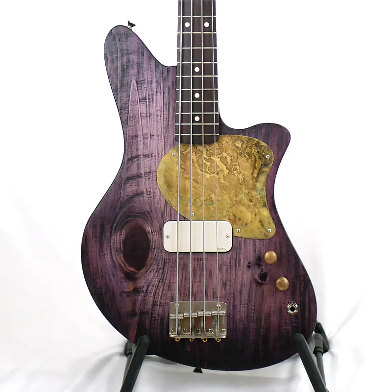 Offbeat Guitars Jackie-O 30-Inch Short-Scale Bass in Wild Violet on Distressed Pine