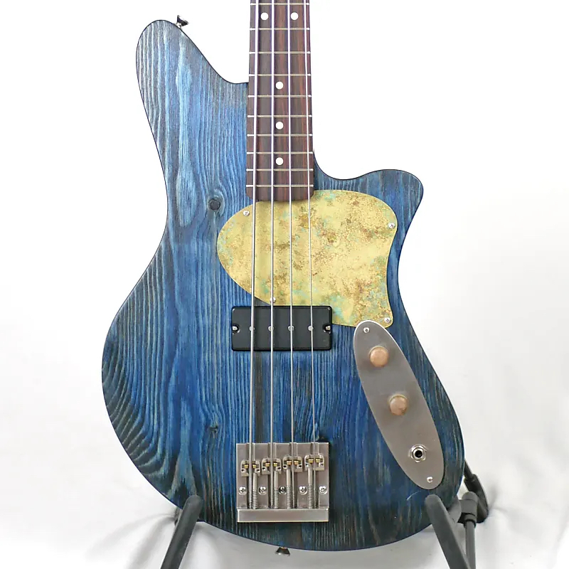 Image is of the front of a Jackie-O SB 30-Inch Short-Scale Bass in Midnight Glow on Distressed Pine with Nordstrand Custom Split Coil Pickup