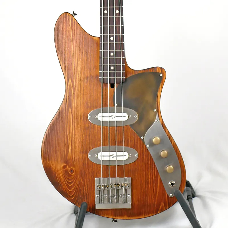 Image is of an Offbeat Guitars Beatrix SC2 30-Inch Short-Scale Bass in Honeycomb on Distressed Pine with Fralin Split Blade Strat Pickups