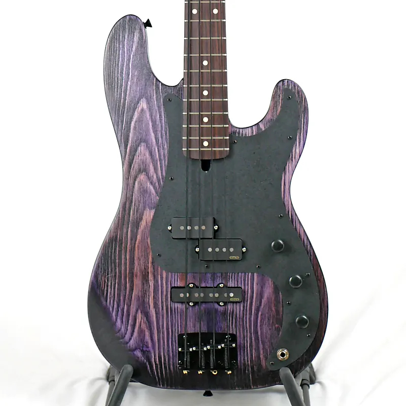 Image is of the front of a Pamela PJ 34" Long-Scale Bass in Grape Glow on Distressed Pine with EMG Geezer Butler PJ Pickups