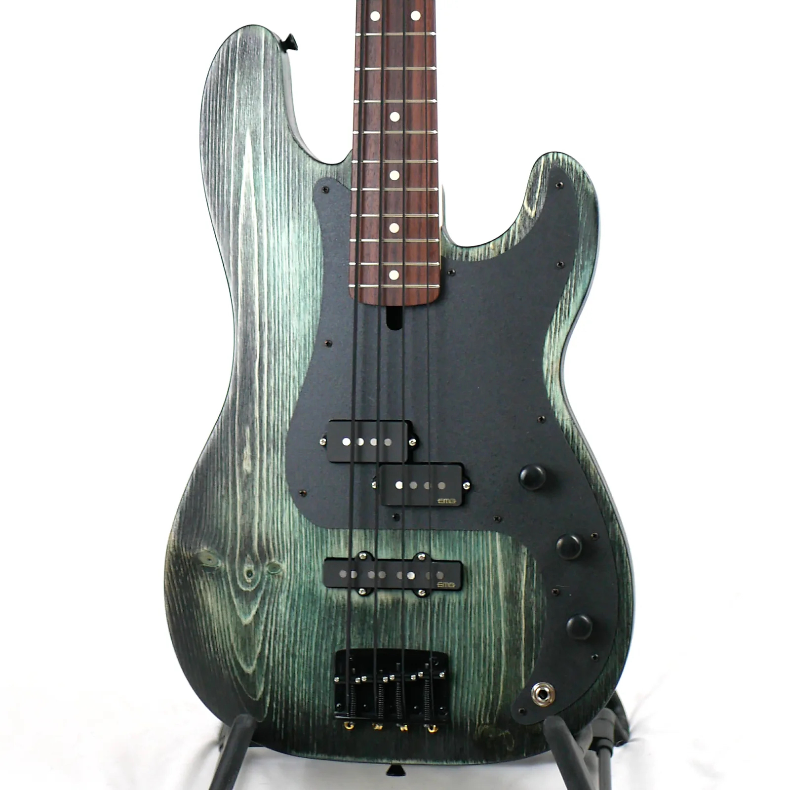 Image is of the front of Pamela PJ 34" Long-Scale Bass in Teal Glow on Distressed Pine with EMG Geezer Butler PJ Pickups